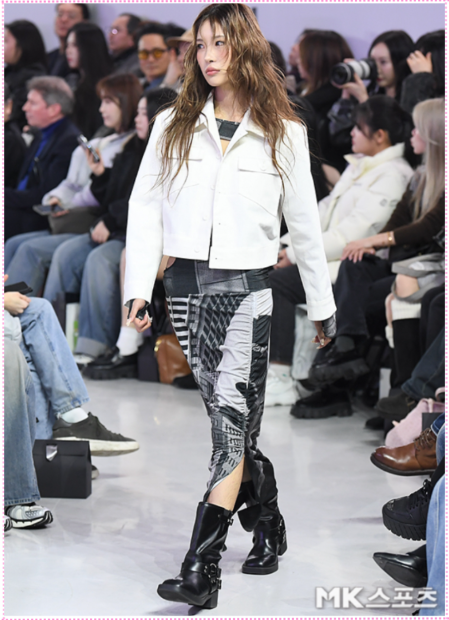 Full body shot of Choi Jun-hee in the 'Phenomenonciper' outfit, showcasing her silhouette.