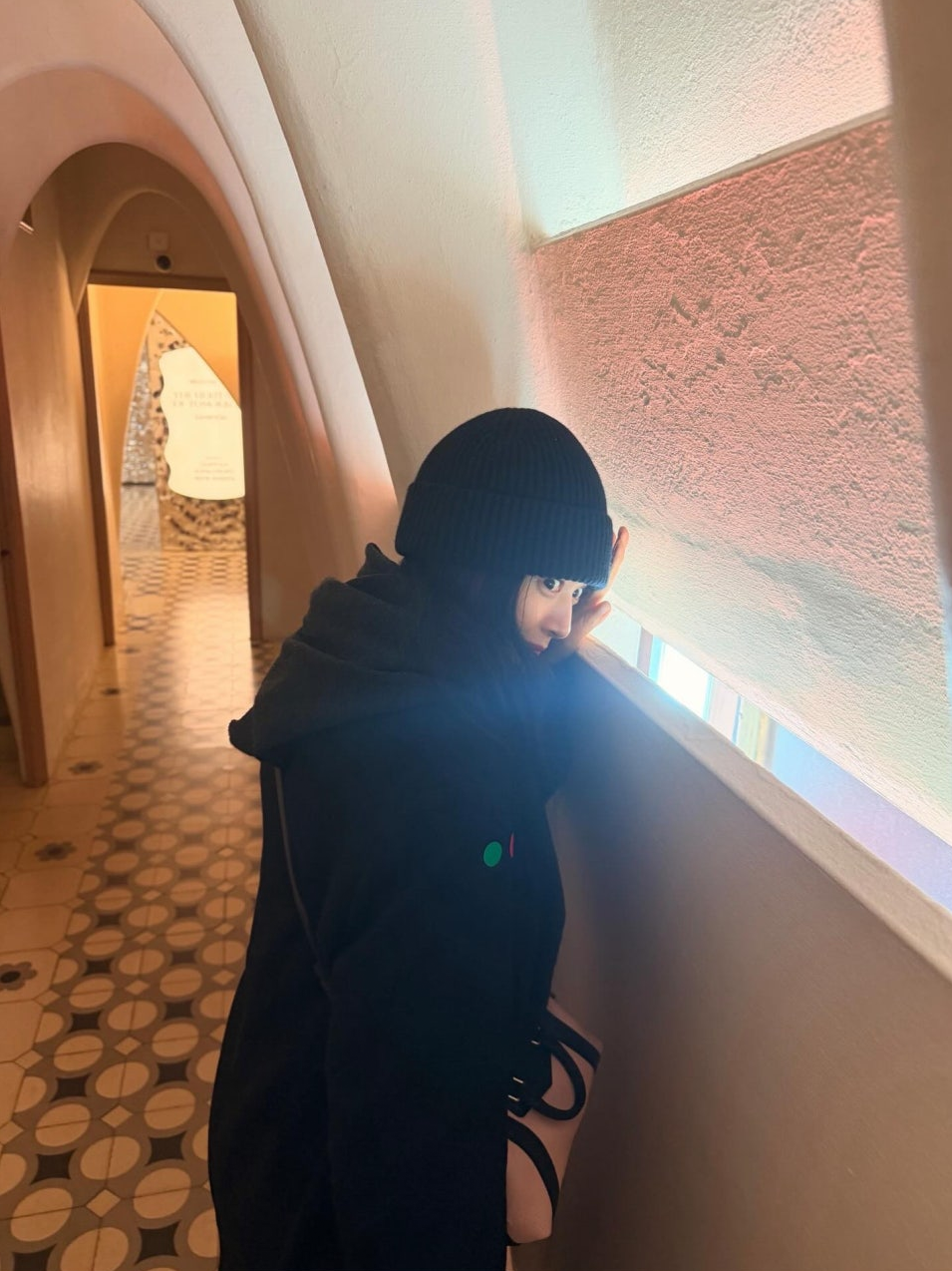 A chic street style shot featuring the Louis Vuitton Nano LV Biker bag