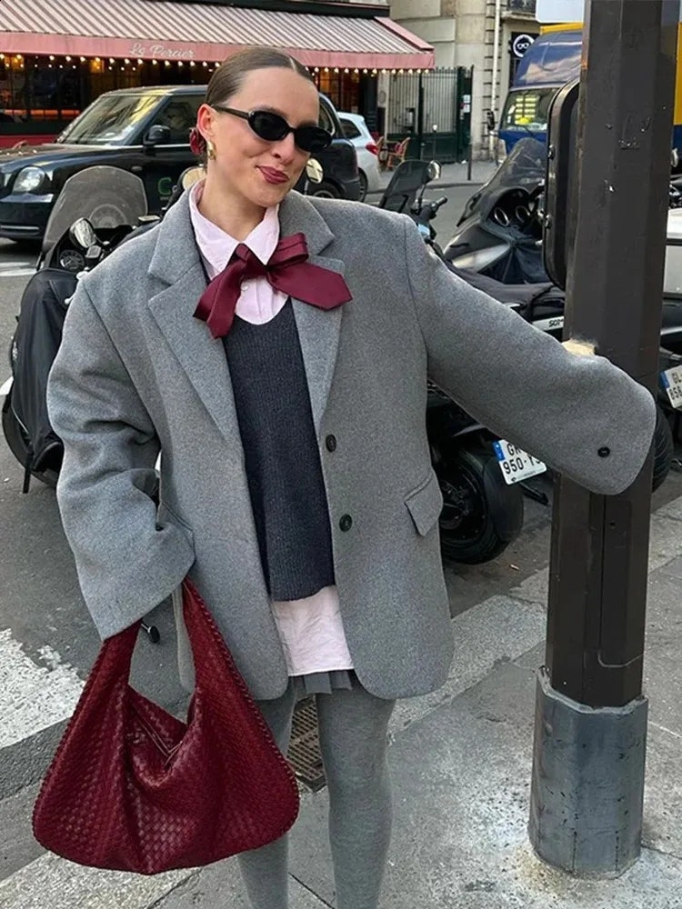 A collection of Lemaire pieces showcasing the brand's signature oversized yet structured designs.