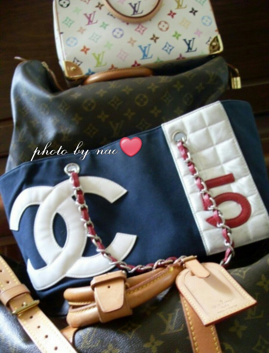 Detail shot of the Louis Vuitton Malletier stamp on a vintage Speedy bag, signifying its special order lineage.