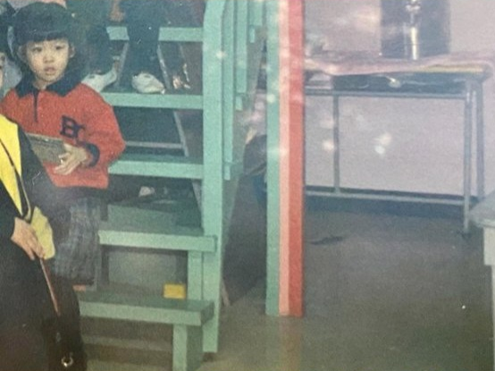 Close-up of the bomber jacket showcasing its textured pigment-dyed leather and relaxed fit.