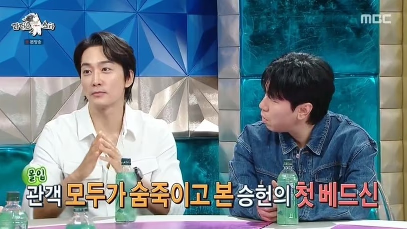 Close-up of the detailed texture of the herringbone jacket.