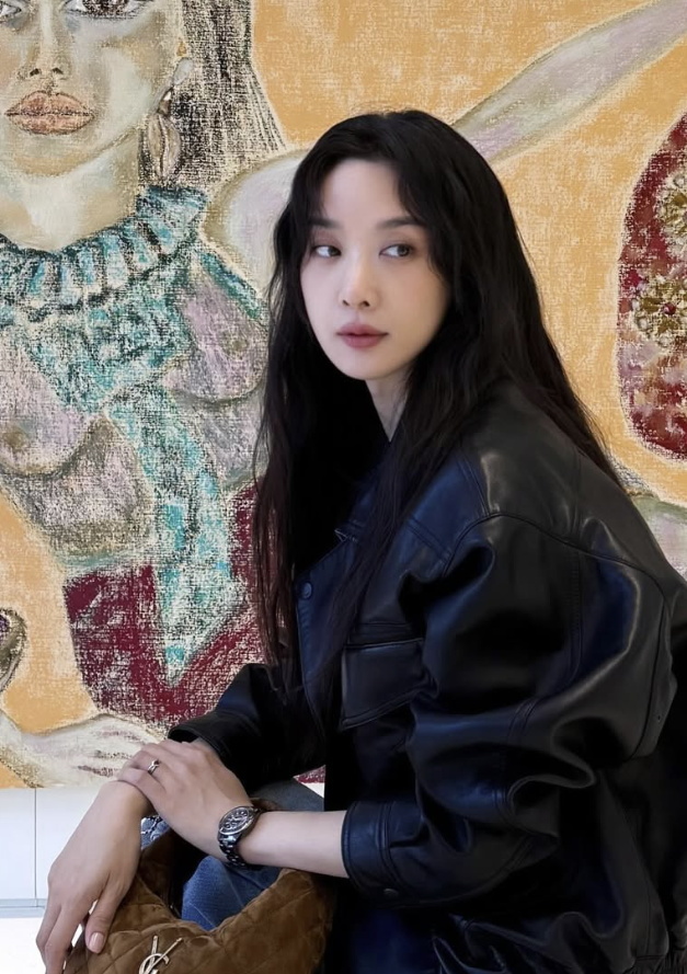 Another angle showcasing the Saint Laurent mini bag's silhouette.