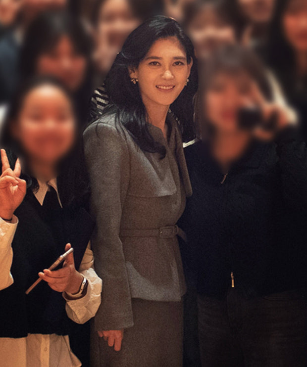 Final look showcasing the timeless appeal of the grey ensemble