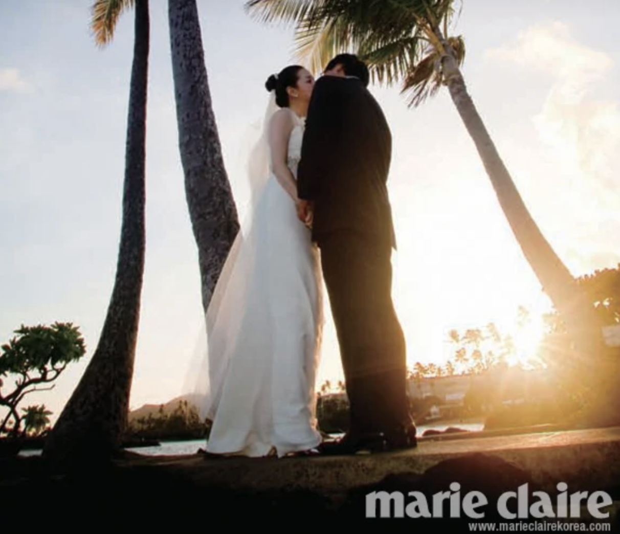 The striking contrast of the white cardigan against the black outfit.