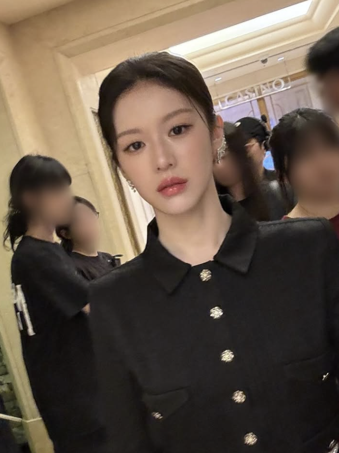 A final image showcasing Go Youn-jung holding the Chanel 11.12 bag, a perfect blend of modern actress and timeless luxury.