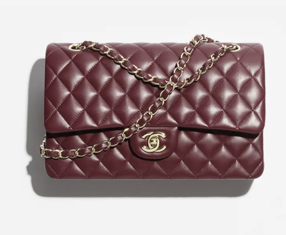 A wider shot of Go Youn-jung, illustrating how the Chanel bag complements her overall outfit and silhouette.