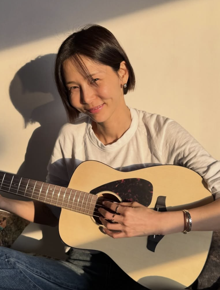 Elegant hand adorned with Chanel Coco Crush