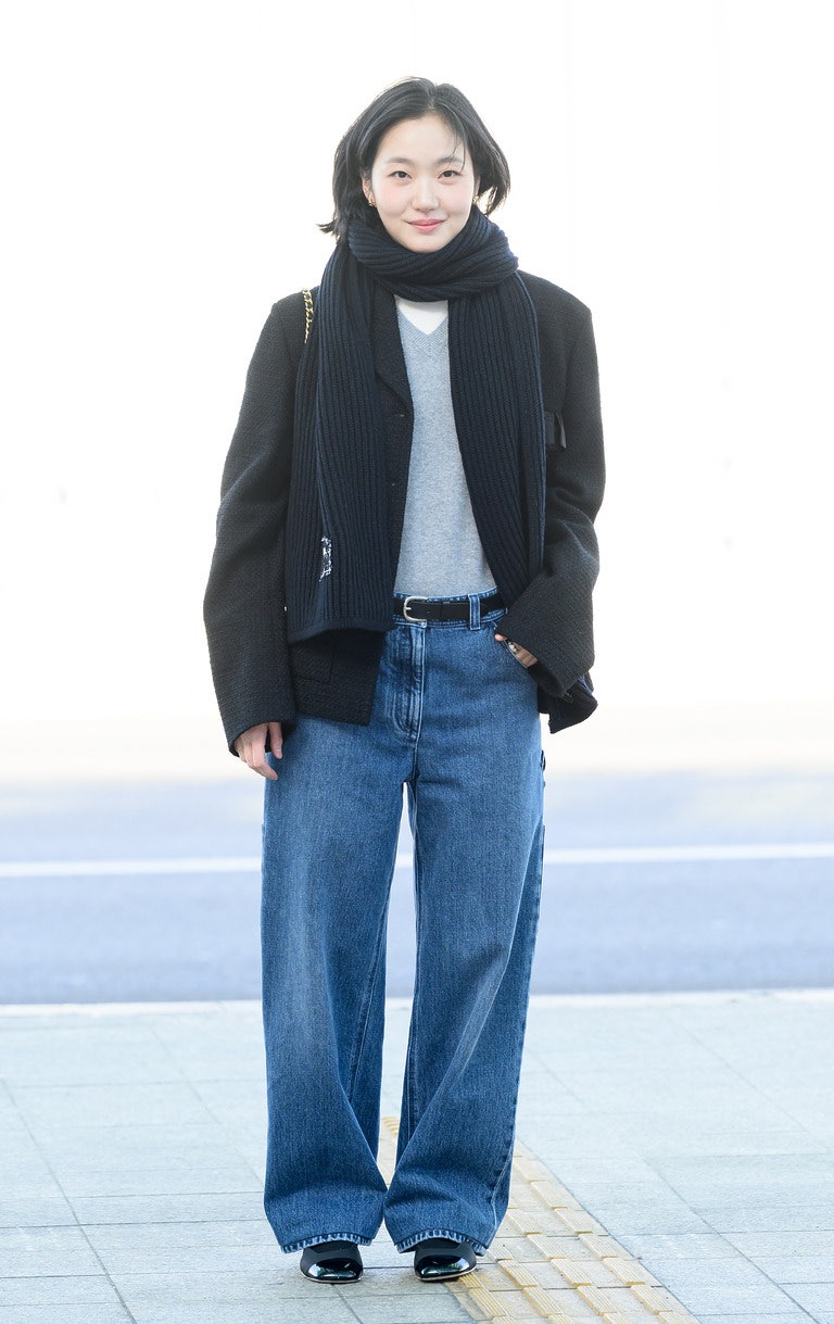 Detail shot of Chanel jewelry worn by Kim Go-eun, emphasizing subtle branding.